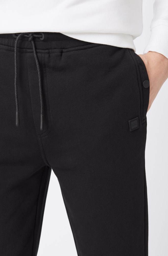 Hugo Boss Relaxed-fit jersey trousers Svarte | MMzu2MXR